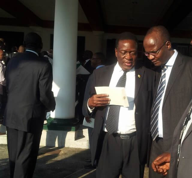 Jonathan Moyo and Emmerson Mnangagwa after being appointed ministers at State House