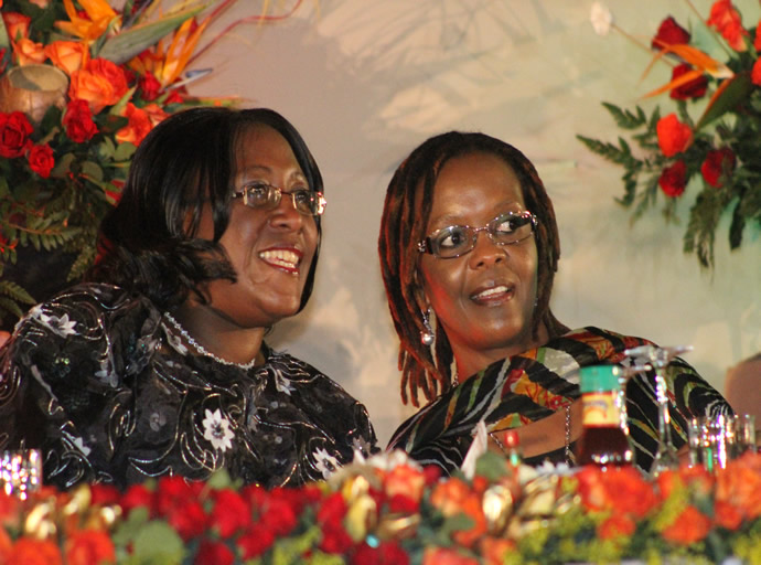 First Ladies Amai Grace Mugabe and Christine Kasebo Sata follow proceedings at the UNWTO official closing in Livingstone, Zambia