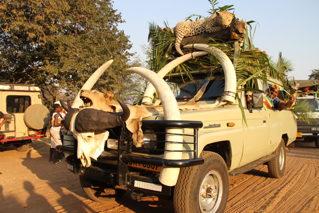 Afrcan Trophy truck making its way into Chinotimba stadium during a street carnival in Victoria Falls