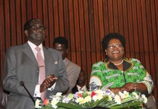 President Mugabe and Vice President Joice Mujuru greet Central Committee members at the Zanu PF Headquarters in Harare yesterday