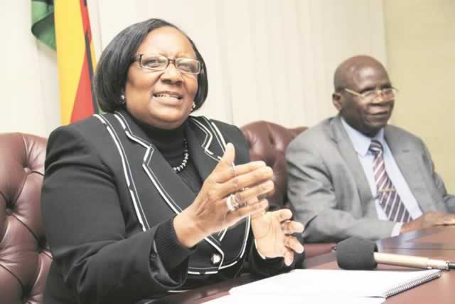 MINISTER of Public Service, Labour and Social Welfare Prisca Mupfumira addresses journalists at a Press conference while the permanent secretary Mr Ngoni Masoka looks on
