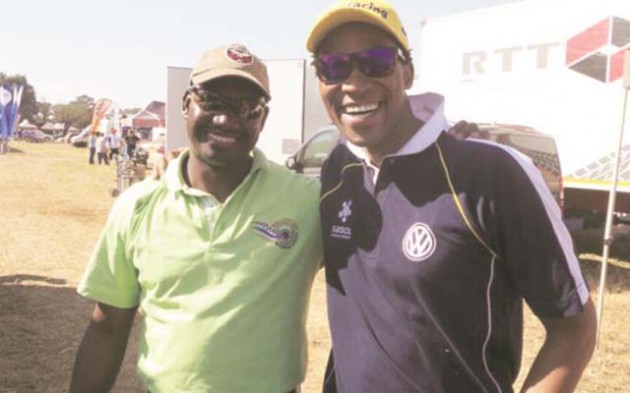 GONE TOO SOON . . . Top South African motor racing driver Gugu Zulu (right) shares some lighter moments with former Zimbabwean motor rally driver Robson Maganezi in May 2004. Zulu died yesterday morning while trying to reach the top of Mount Kilimanjaro in Tanzania