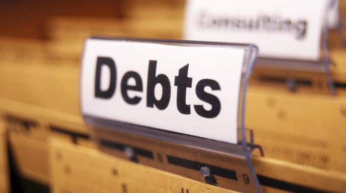 Global debt pile declines, but borrowing still a risk
