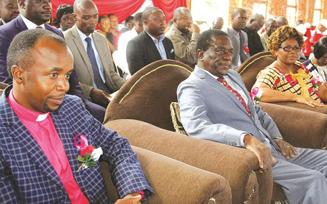 Vice-President Emmerson Mnangagwa (centre) is flanked by Minister of State for Harare Provincial Affairs Miriam Chikukwa (right) and the newly appointed  Kuwadzana Extension Methodist Church in Zimbabwe Superintendent Reverend Victor Chidzambwa during his welcome ceremony in Kuwadzana, Harare yesterday. — (Picture by Memory Mangombe)