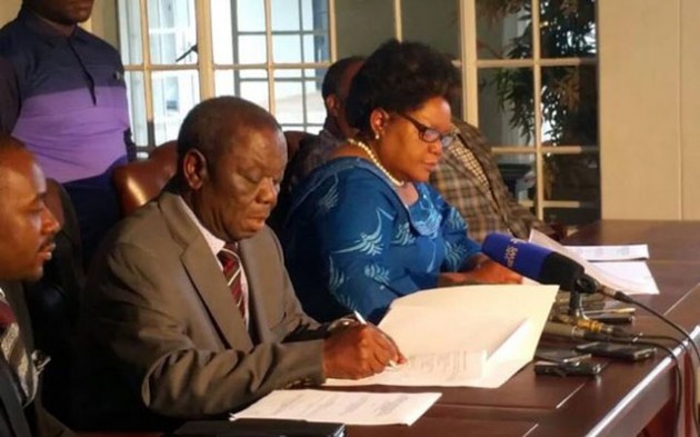 MDC-T leader Morgan Tsvangirai and Joice Mujuru sign their Memorandum of Understanding at the former’s residence in Harare last week