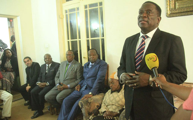 Vice President Emmerson Mnangagwa consoles Muzenda family members at their residence in Chisipite, Harare, yesterday. Looking on are Senator Tsitsi Muzenda, Minister of State for Liaising in Psychomotor Activities in Education and Vocational Training Josaya Hungwe, Agriculture, Mechanisation and Irrigation Development Minister Dr Joseph Made and Information, Media and Broadcasting Services Minister Dr Christopher Mushohwe