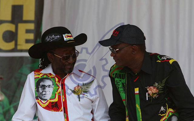 Cde Patrick Zhuwao and Professor Jonathan Moyo before the formal proceedings at Mkoba Teachers College where President Mugabe is expected to address more than 120 000 Zanu-PF supporters this afternoon. 