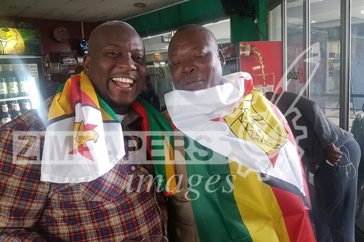 Soccer legend Moses Chunga joins thousands of citizens to march against President Robert Mugabe