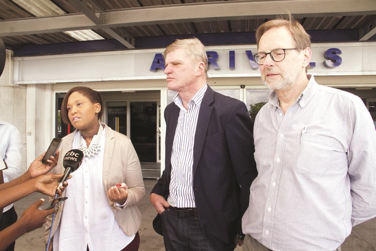 Swedish investors Mr Ake Hultqvist (right), Mr Ulf Georgson (centre) and Shiloah Empowerment Trust founder Ms Stephanie Shiri on arrival at Robert Mugabe International Airport yesterday. — Picture by John Manzongo