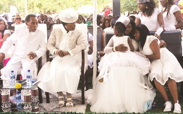 Zimbabwe Assemblies of God Africa (ZAOGA Forward in Faith) church Archbishop Dr Ezekiel Guti, his wife Eunor, the late Ezekiel Jnr’s widow Caroline Guti and his daughters at Glen Forest Memorial Park in Harare for the burial yesterday. — (Picture by Innocent Makawa)