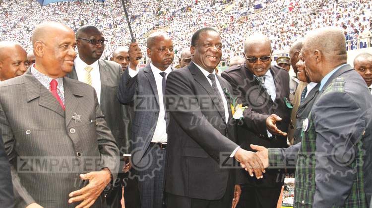 President Mnangagwa at the Zion Christian Church elders while flanked by the church’s leader Bishop Nehemiah Mutendi (left) at the National Sports Stadium in Harare last week