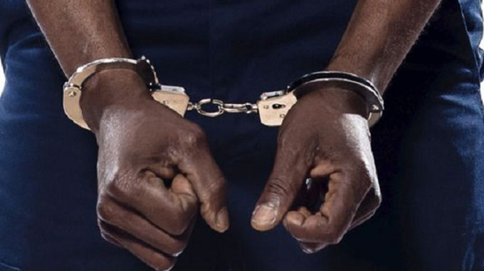 Detectives nabbed for US$1 000 extortion