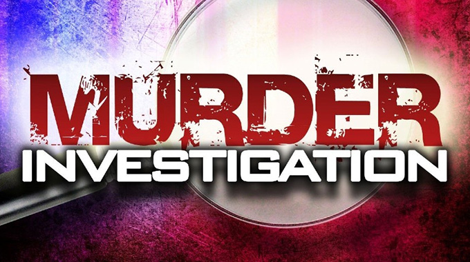 Police hunt for murder suspect