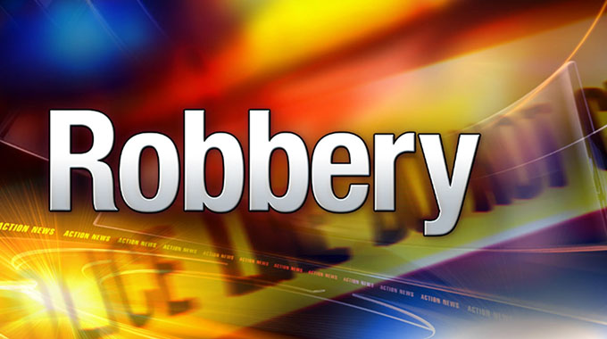 Suspects drop US$5 000 at robbery scene